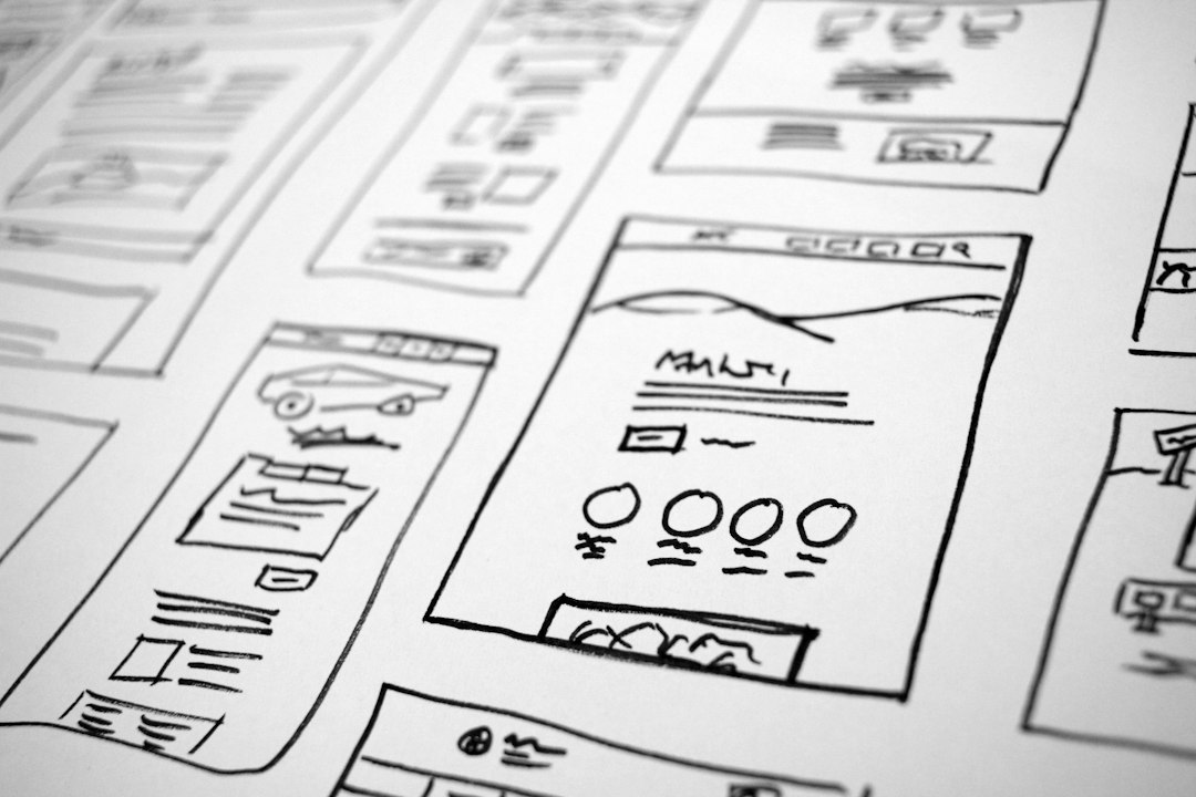 Business owner reviewing small business website redesign cost estimates, feature lists, and timeline notes with a web consultant in a modern office